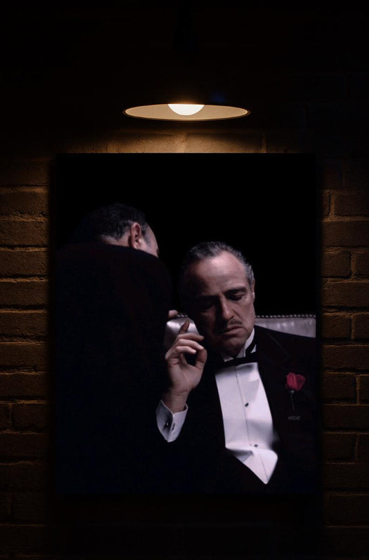Framed movie poster of a man in a tuxedo against a brick wall with a light fixture printed on velvet 