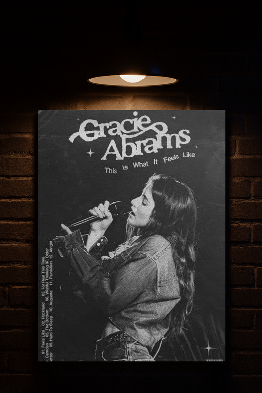 Poster of Gracie Abrams with a black and white photo of a woman singing, against a dark brick wall printed on velvet 